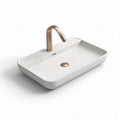 Vessel sink with rose gold faucet and ceramic basin 50 x 30 x 15cm